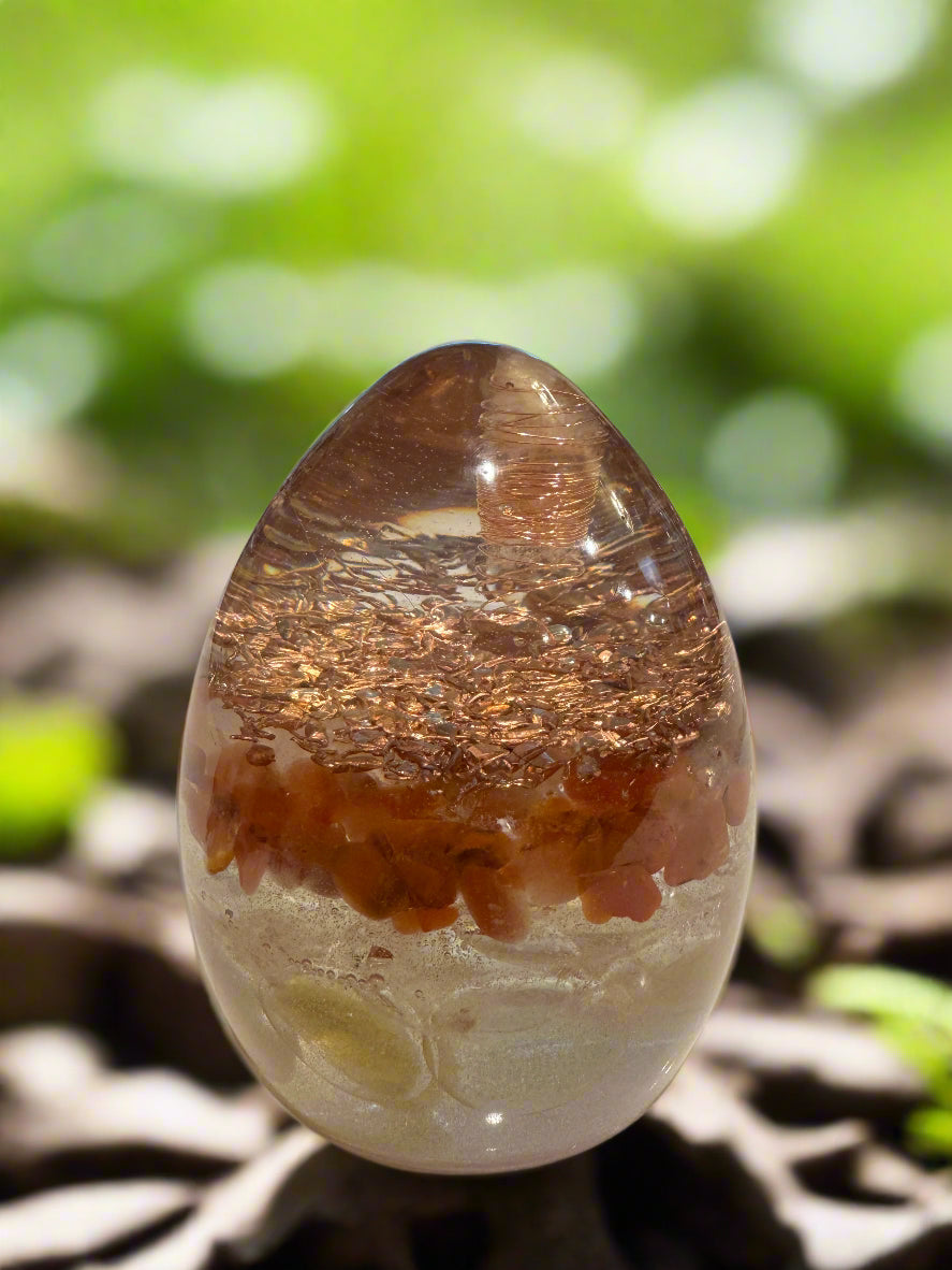 Large Orgonite Egg with Carnelian and Copper-Wrapped Quartz point